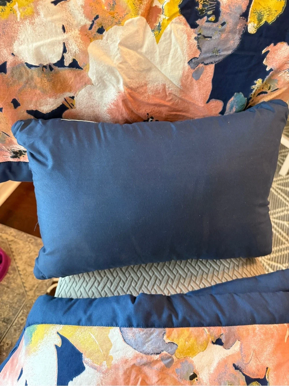 Lush decor Navy Blue and floral queen pillow case set with decorative pillow.